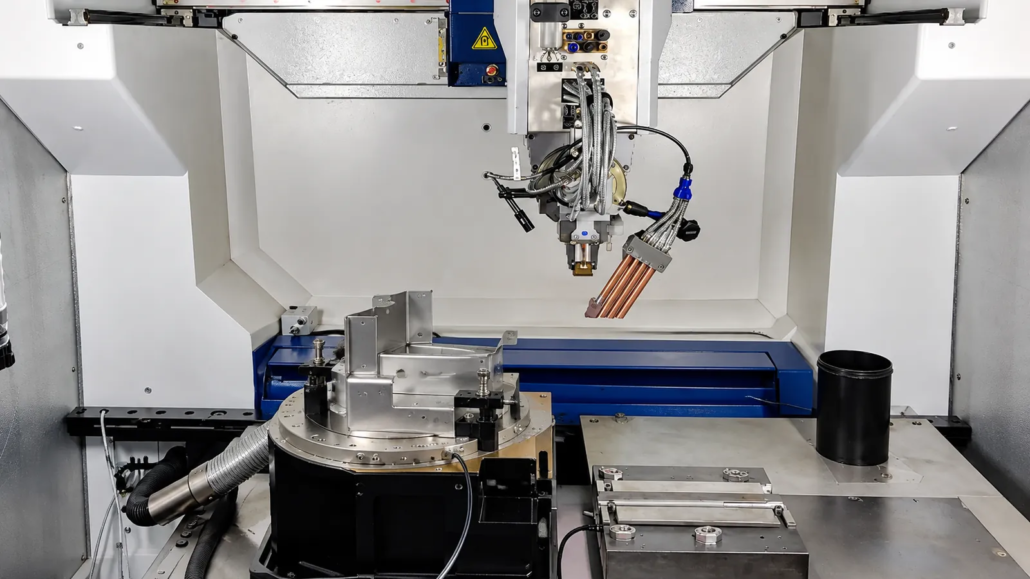 Robotic laser welding cell with clamping fixture on a rotary table